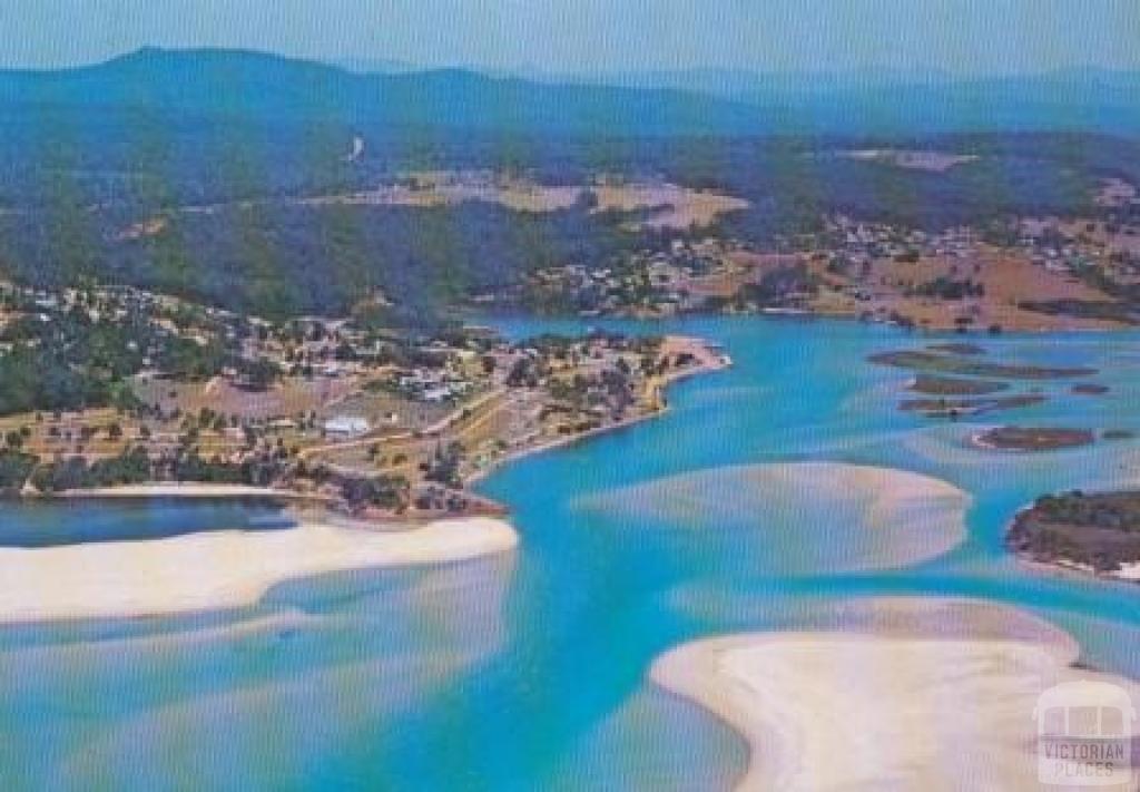 Aerial view of Mallacoota Camp Park and township from Bar