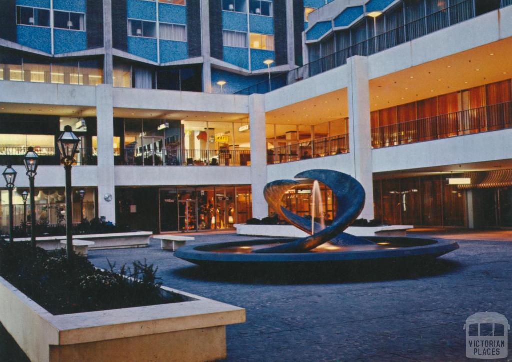 Southern Cross Hotel Plaza and fountain at dusk, Melbourne, 1971